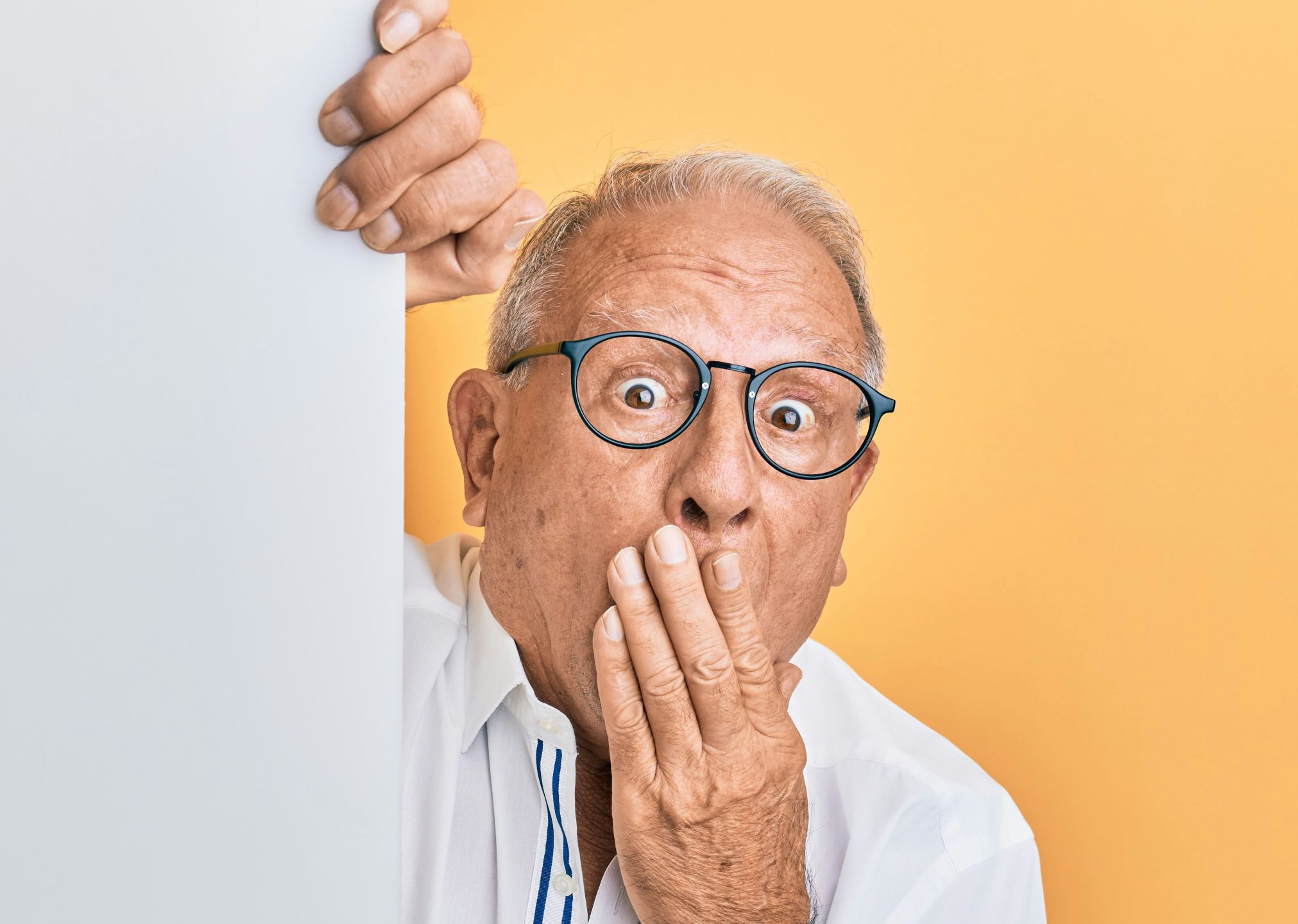 A man with a shocked expression.